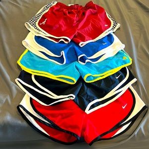4 pairs of Nike shorts and 1 pair of adidas shorts smalls and medium